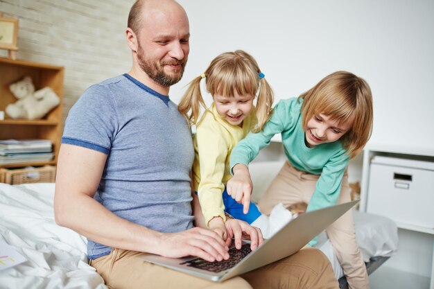 father Helping daughters