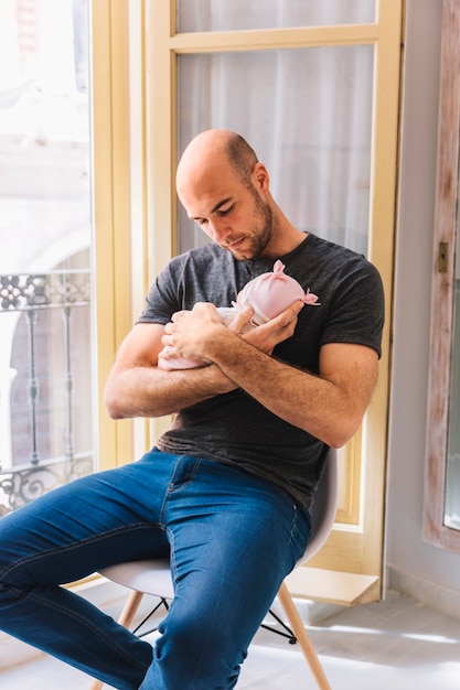 Father holding baby