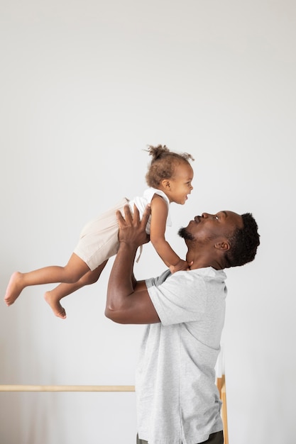 Free photo father and little daughter spending time together