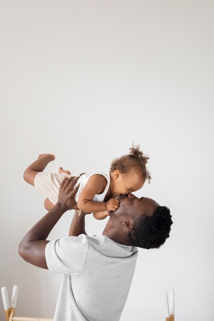 Free photo father and little daughter spending time together