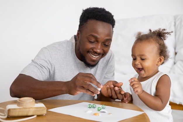 Father and little daughter spending time together