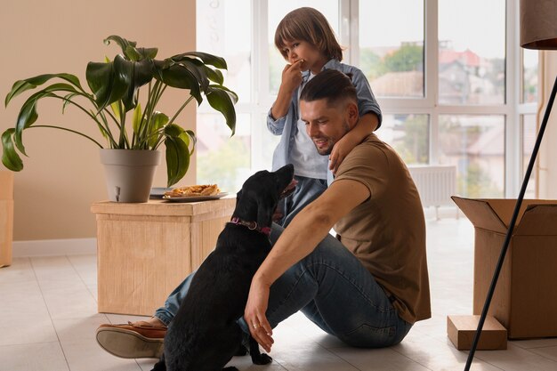 Father moving in new house with his child