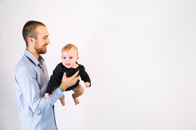 Father playing with baby