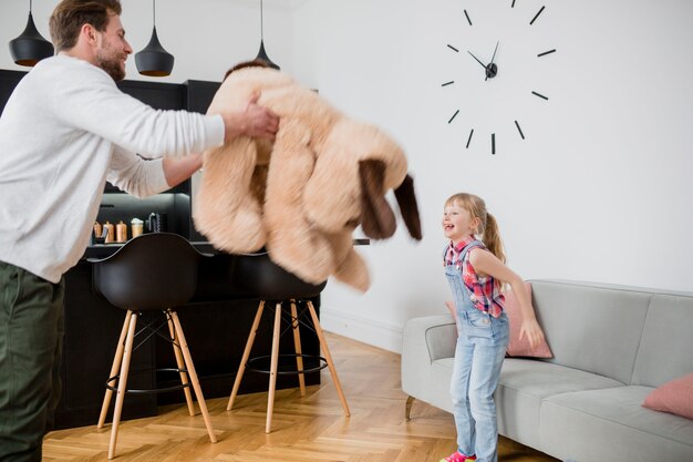 Father playing with daughter