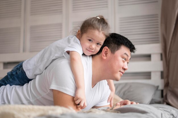 Father playing with daughter