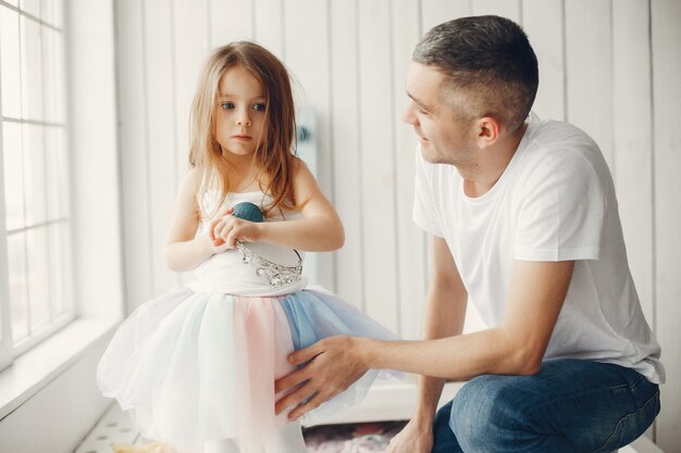 Father playing with a little daughter