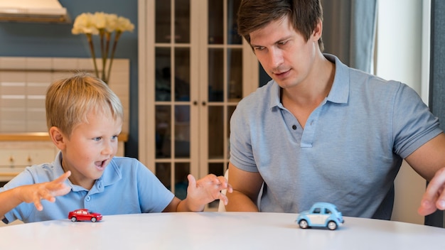 Father playing with with young boy