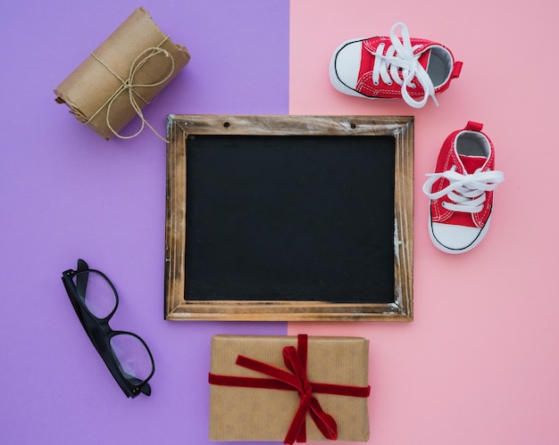 Father's day composition with blank slate and decorative items