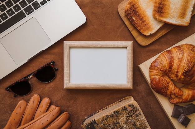 Father's day composition with breakfast and blank frame