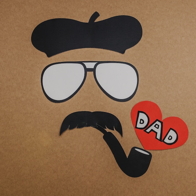 Father's day composition with character and red heart