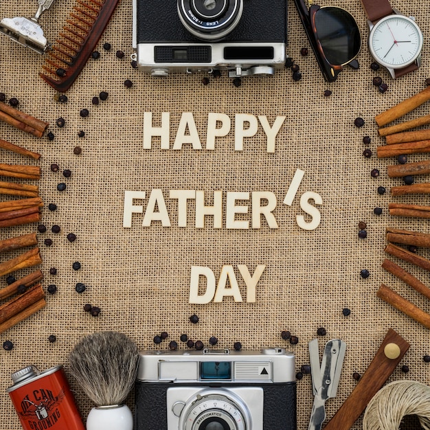 Free photo father's day composition with cinnamon sticks and decorative items