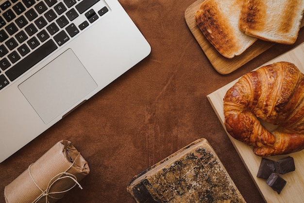 Father's day composition with delicious croissant