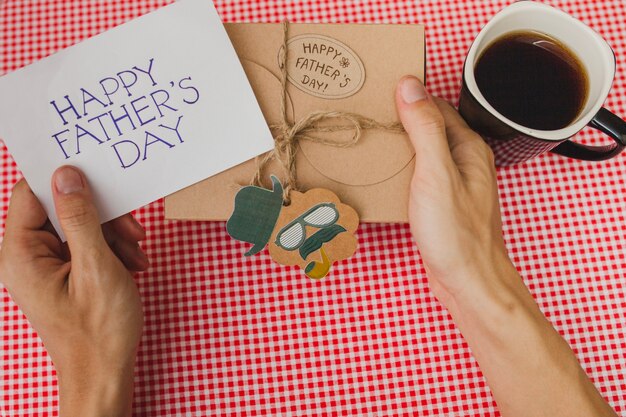 Father's day composition with present and coffee cup