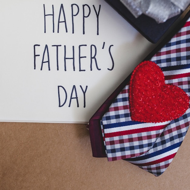 Father's day composition with red heart and necktie