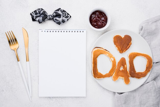 Father's day top view with bread copy space