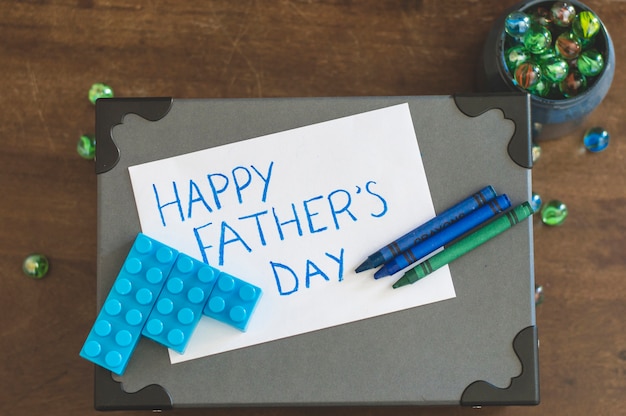 Father's day writing, marbles and toy bricks