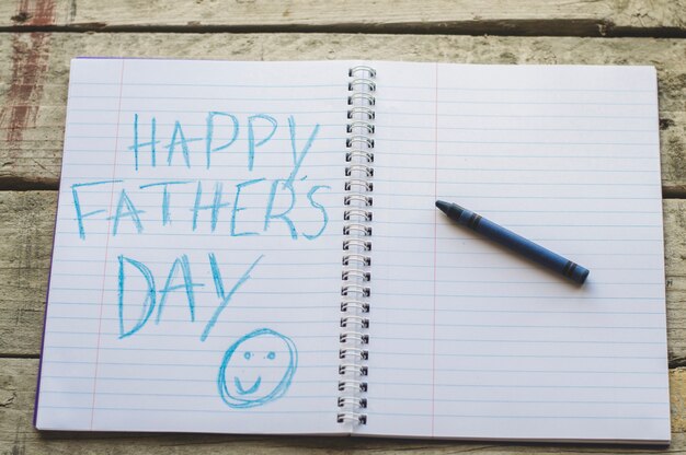 Father's day writing in notebook