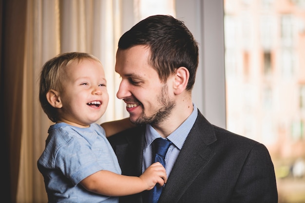 Father and son laughing