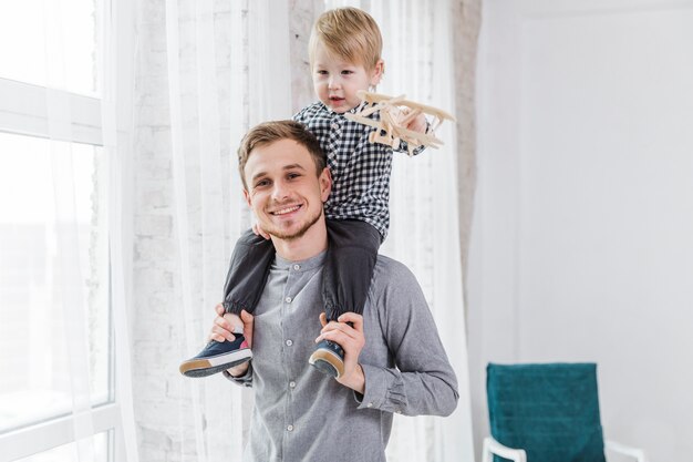 Father and son playing together on fathers day