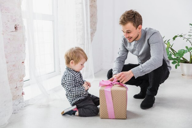 Father and son playing together on fathers day