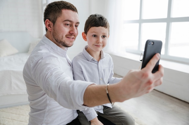 Father and son playing together on fathers day