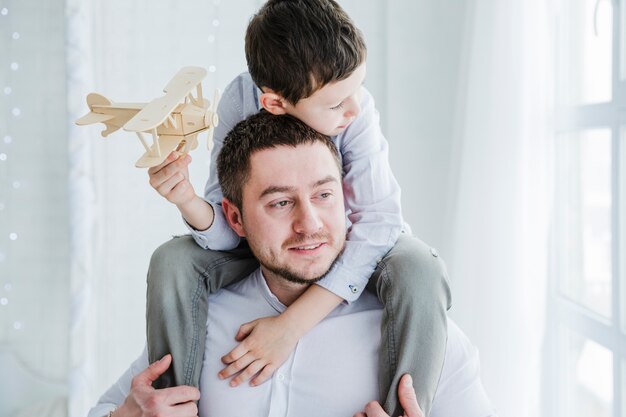 Father and son playing together on fathers day