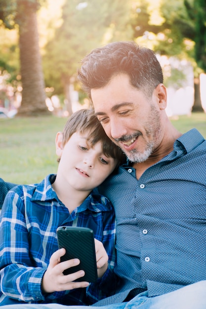 Free photo father and son together outdoors