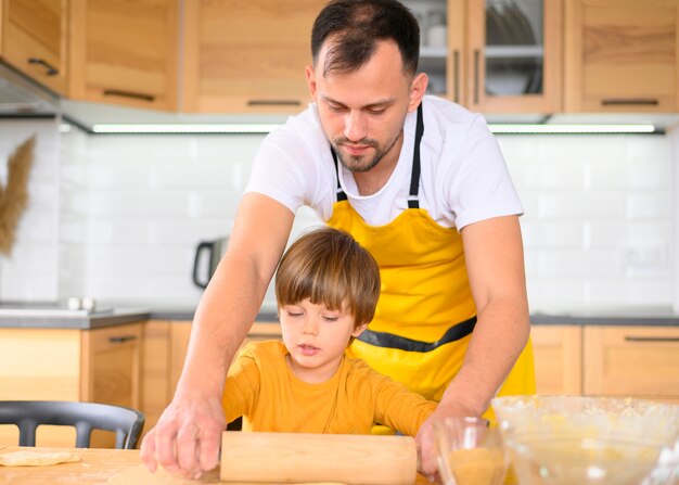 Father and son using the paddle