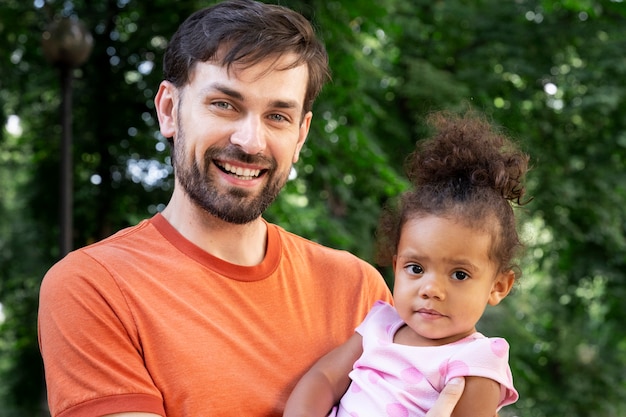 Father spending time together with his girl outdoors