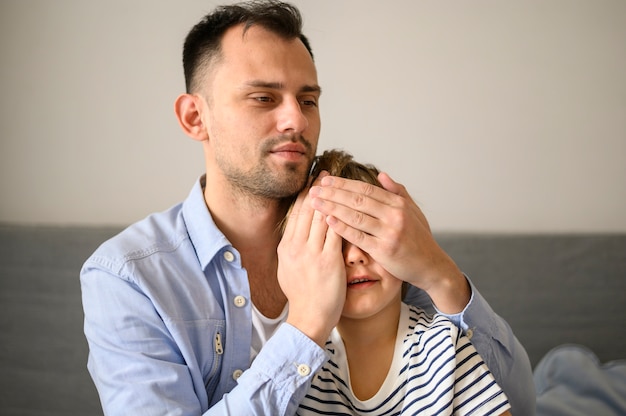 Free photo father surprising his child