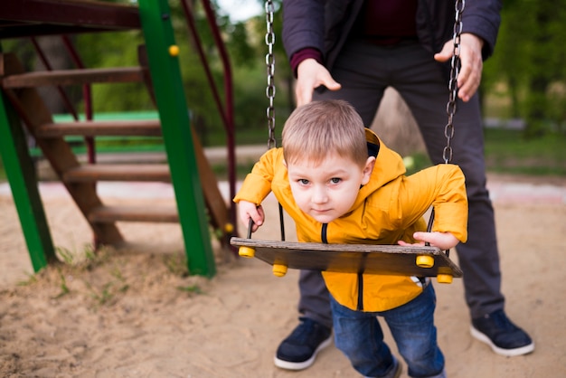 Free photo father with child in nature