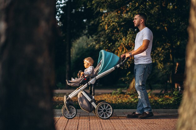 Father with his daughter walking in park