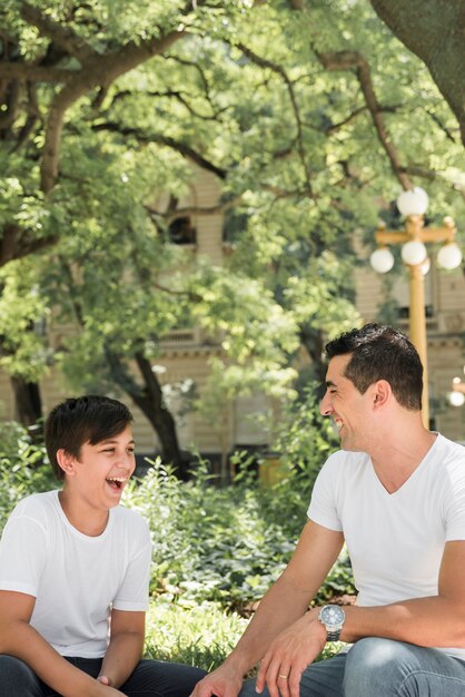 Free photo father with his family outdoors