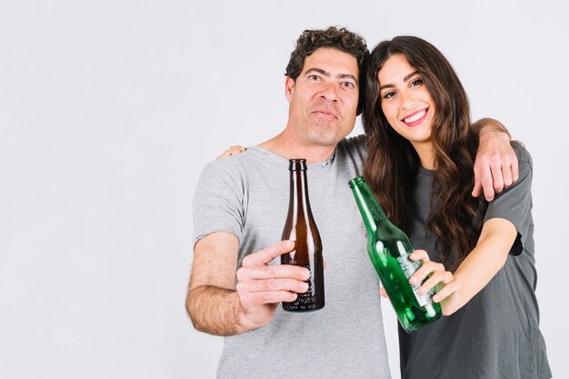 Fathers and daughter drinking beer together