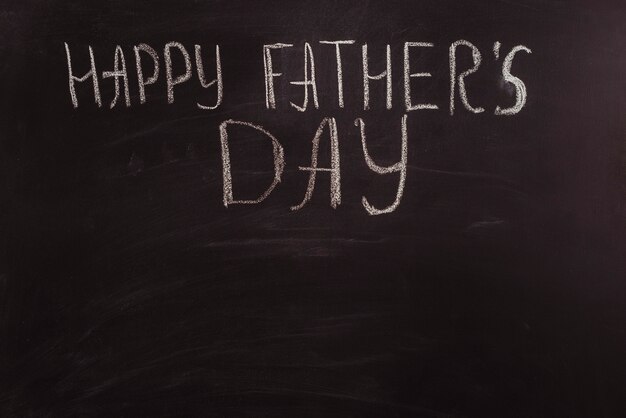 Fathers day composition on blackboard with copyspace