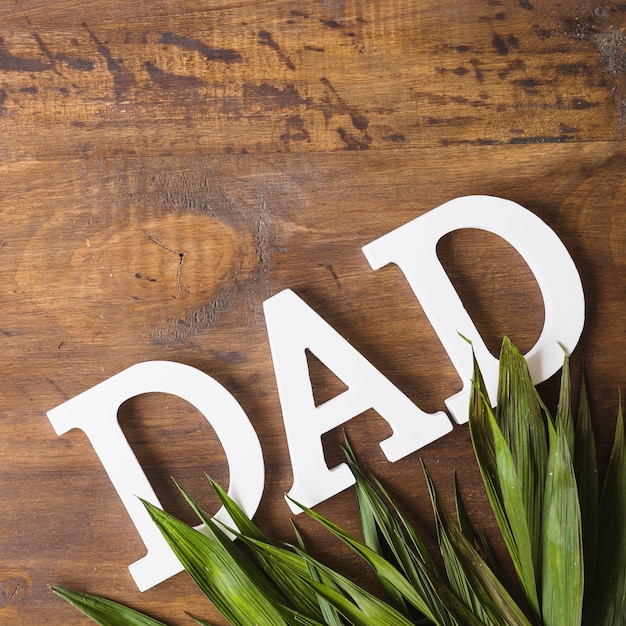 Fathers day composition with leaves and letters