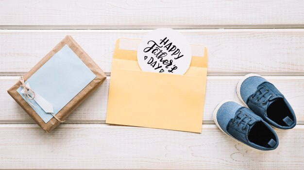 Fathers day composition with present box and shoes