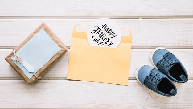 Fathers day composition with present box and shoes