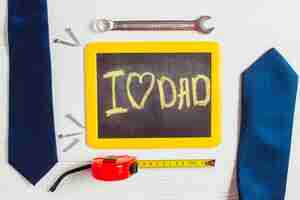 Free photo fathers day composition with slate and ties