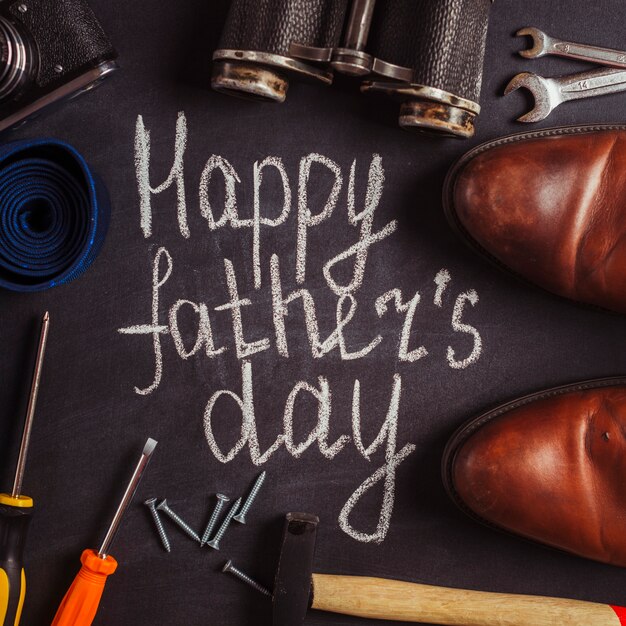 Fathers day composition with tools and shoes