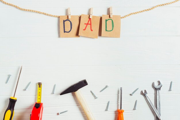 Fathers day concept with tools and letters