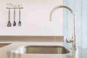 Free photo faucet sink at kitchen