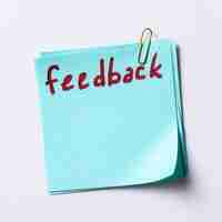 Free photo feedback word written in a paper note