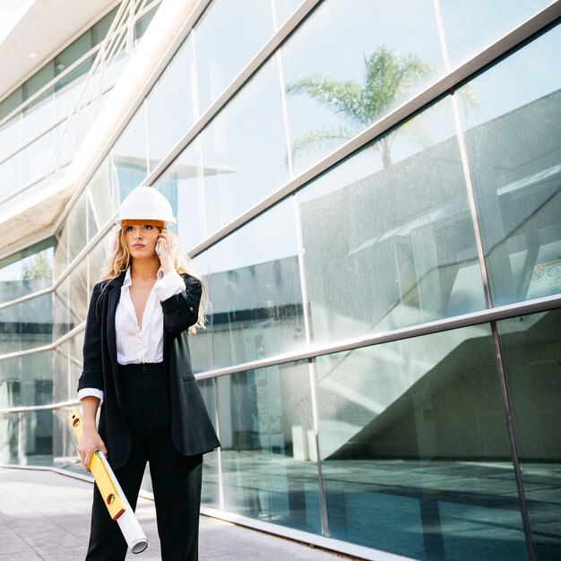 Female architect with helmet