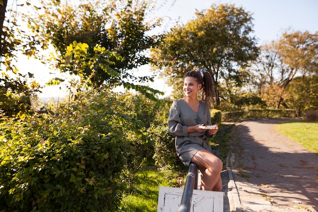 Female artist painting outdoors