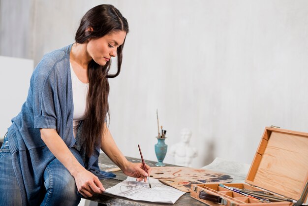 Female artist painting