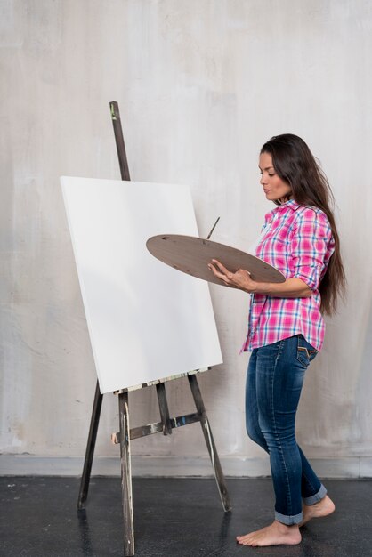 Female artist painting