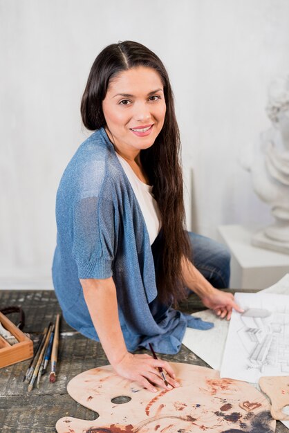 Female artist in studio