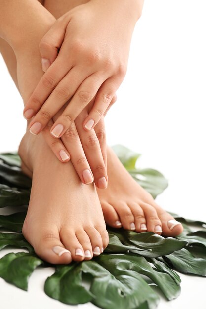 Free Photo female bare feet and hands. manicure and pedicure concept