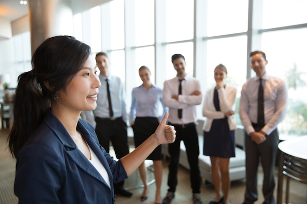 Female Business Leader with Thumb up